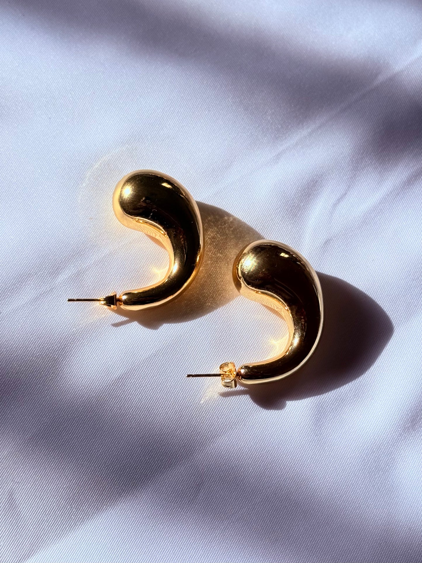1 paire de boucles d'oreilles